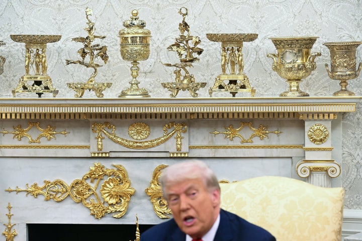 Gold-colored ornaments and decor are seen as U.S. President Donald Trump speaks during a meeting with Turkey's President Recep Tayyip Erdogan in the Oval Office of the White House in Washington, D.C., on Sept. 25, 2025.