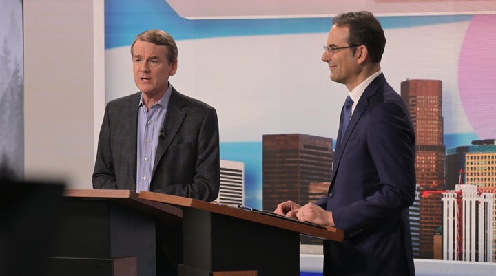 Sen. Michael Bennet, left, and state Attorney General Phil Weiser, both running for the Democratic nomination for governor of Colorado, met for a debate on May 7, 2026, in Denver. 