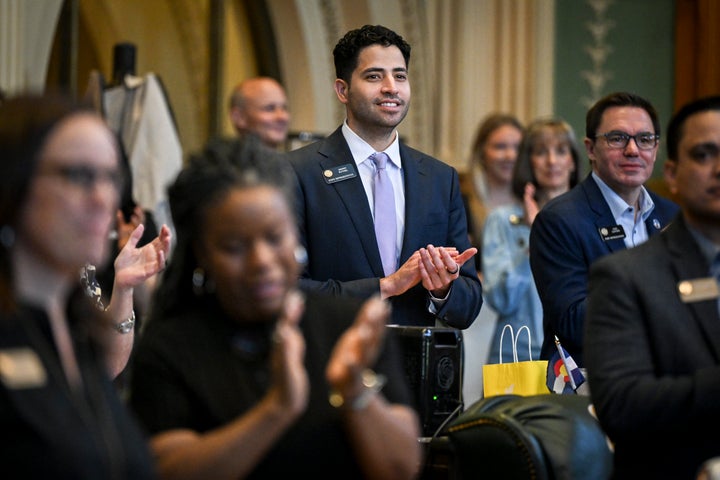 State Rep. Manny Rutinel applauds during the last day of the legislative session at the Colorado State Capitol Building in Denver on May 13, 2026.