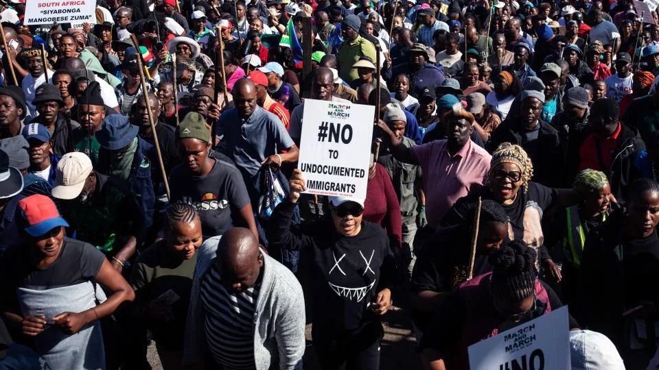 People rally against illegal immigration during a protest organized by activist group March & March on June 19 in Pietermaritzburg. - Per-Anders Pettersson/Getty Images