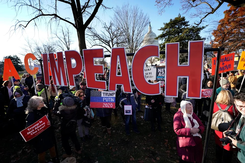 Trump was impeached twice by the Democratic-led House of Representatives, first in 2019 over allegations of abusing the power of his office by attempting to extort a political favor from Ukraine, and again in January 2021 with charges of ‘incitement of insurrection’ following the January 6, 2021 Capitol riots (Getty Images)
