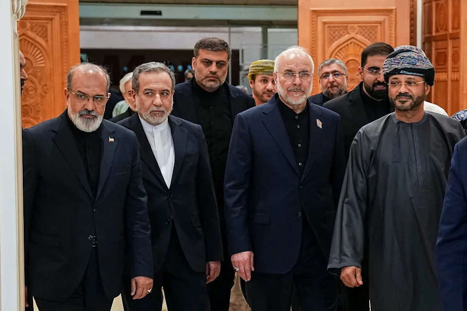Iranian Foreign Minister Abbas Araghchi (2nd L), Iranian parliament speaker Mohammad Bagher Ghalibaf (2nd R), and Omani Foreign Minister Badr bin Hamad Al Busaidi (R) walk inside a building in Muscat, Oman, on June 22, 2026. / Credit: Hamed Malekpour/Middle East Images/AFP/Getty