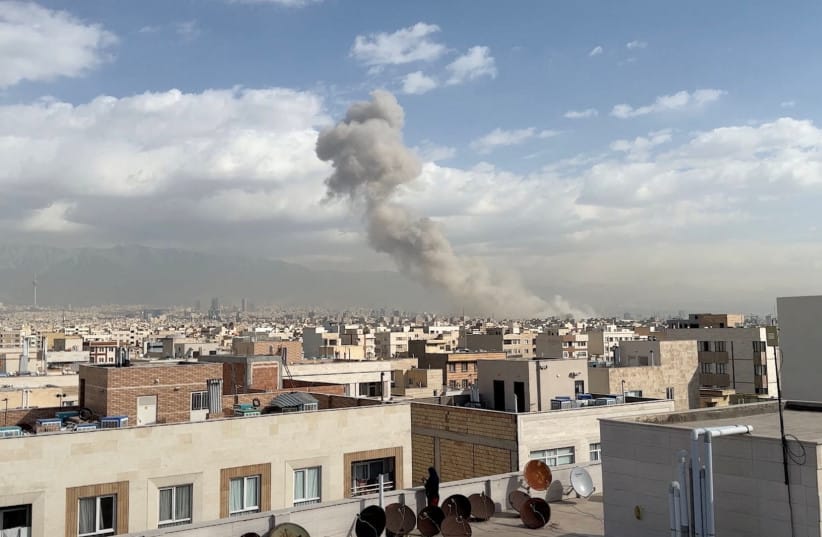 Smoke rises following an explosion, after Israel's Defence Minister Israel Katz said Israel had launched a pre-emptive attack against Iran, in Tehran, Iran February 28, 2026 (credit: WANA