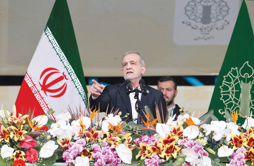 Iranian President Masoud Pezeshkian speaks on the 47th anniversary of the Islamic Revolution in Tehran, in February. 