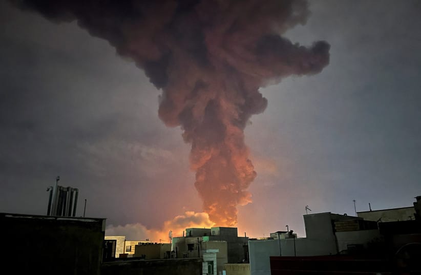 Smoke rises following an explosion in Tehran amid the war with Iran, March 7, 2026. Picture taken with a mobile phone. (credit: MAJID ASGARIPOUR/WANA