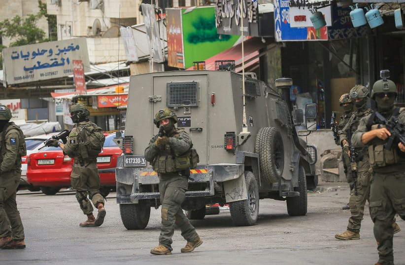 Israeli security forces operate during a raid in the West Bank city of Nablus, May 3, 2026.