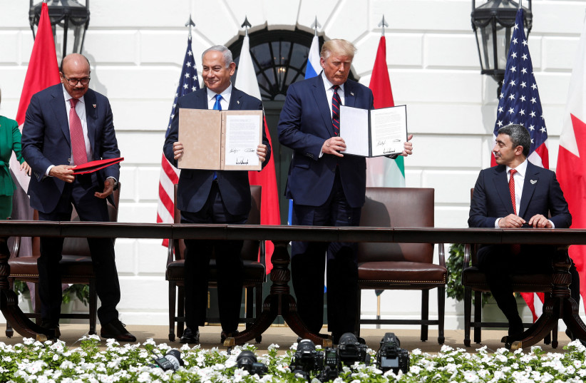 Bahrain's Foreign Minister Abdullatif Al Zayani, Israel's Prime Minister Benjamin Netanyahu, US President Donald Trump and UAE Foreign Minister Abdullah bin Zayed participate in the signing of the Abraham Accords in Washington, September 15, 2020.