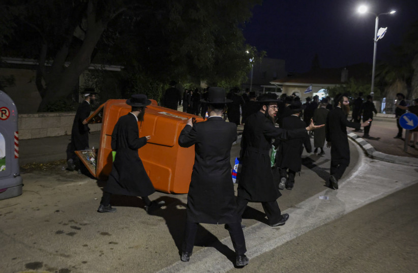 Ultra orthodox jewish men protest against the jailing of yeshiva students who failed to comply with an army recruitment order, at the home of Supreme Court Deputy President Noam Sohlberg in the settlement of Alon Shvut, June 3, 2026.