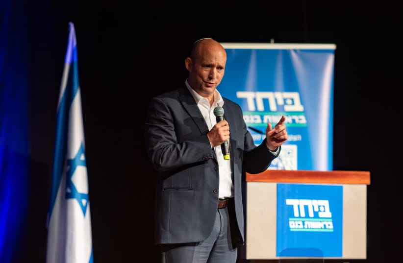 Former Prime Minister Naftali Bennett speaks during an election event for the joint list Together ahead of the upcoming elections, in Haifa, June 2, 2026.
