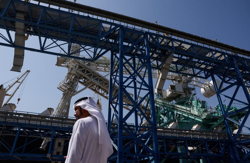 A man walks at the Port of Fujairah, as the U.S.-Israel conflict with Iran limits marine traffic in the Strait of Hormuz, in Fujairah, United Arab Emirates, May 6, 2026.
