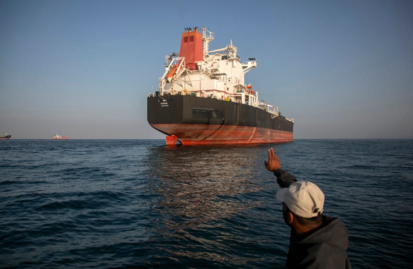 Ships are anchored in the Strait of Hormuz, May 16. Shipping through Hormuz has still not returned to normal.