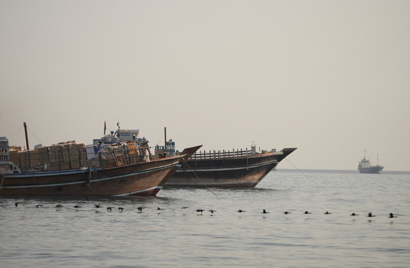 Vessels are anchored in the Strait of Hormuz, as seen from Musandam, Oman, June 10, 2026.