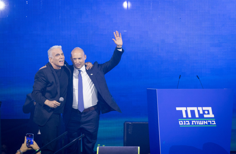 Opposition Leader Yair Lapid and former Prime Minister Naftali Bennett attend an election event for the joint list “Together” ahead of the upcoming elections, in Tel Aviv, central Israel, May 12, 2026. The list is set to be led by Bennett.