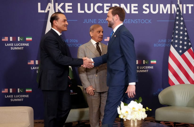 US Vice President JD Vance shakes hands with Pakistan's Chief of Army Staff Field Marshal Asim Munir, next to Pakistan's Prime Minister Shehbaz Sharif, as they meet for high-level talks aimed at advancing a deal to end the Middle East conflict, at the Buergenstock Resort Lake Lucerne.