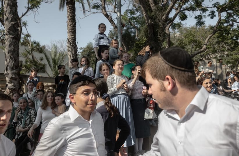 Ladies in Bnei Brak watching as the men leave to protest outsidem of Military Prison 10 on June 24, 2026.