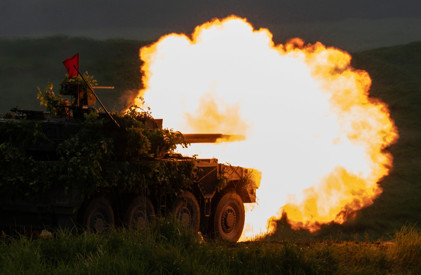 A Japan Ground Self-Defense Force (JGSDF) maneuver combat vehicle fires ammunition during a live-fire exercise at the East Fuji Maneuver Area on June 07, 2026, in Gotemba, Shizuoka Prefecture, Japan.