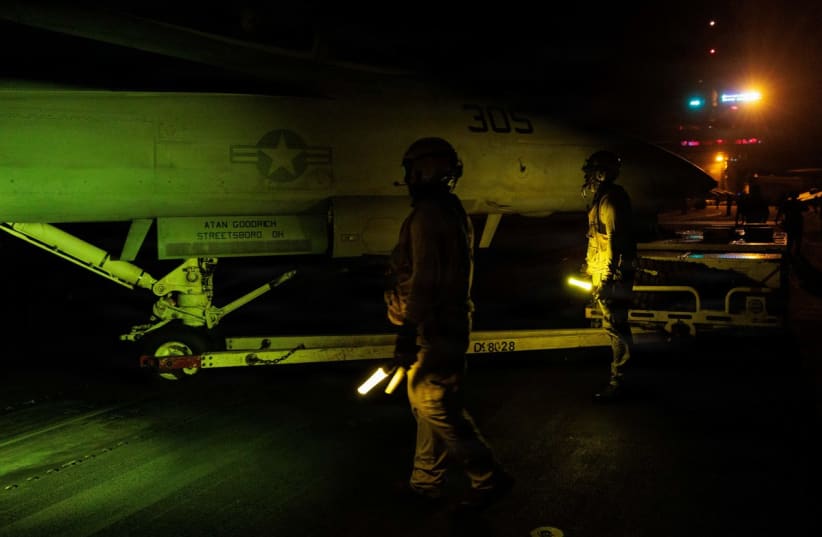 US Sailors conduct nighttime operations aboard USS George H.W. Bush (CVN 77) while sailing the Arabian Sea, June 26, 2026.