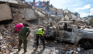 Rescuers and volunteers search for survivors on the rubble of a collapsed building in La Guaira state, Venezuela, on June 28, 2026.