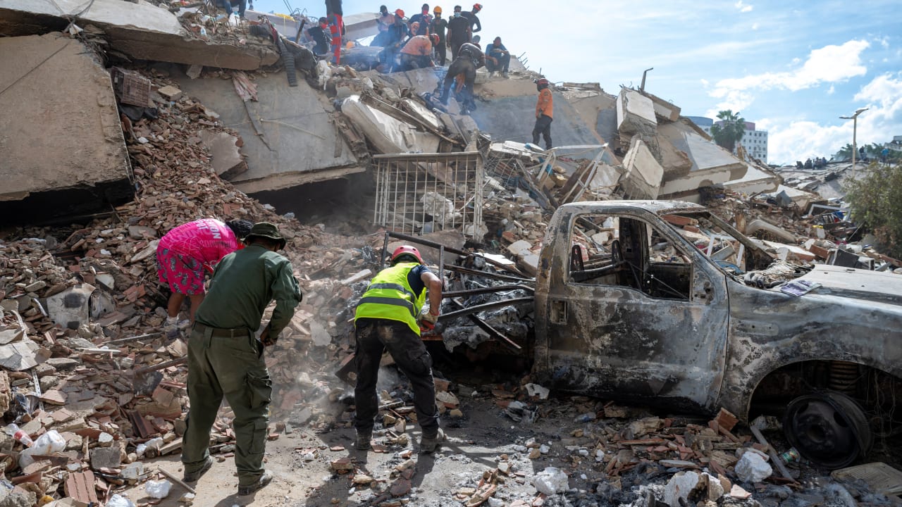 Rescuers and volunteers search for survivors on the rubble of a collapsed building in La Guaira state, Venezuela, on June 28, 2026.