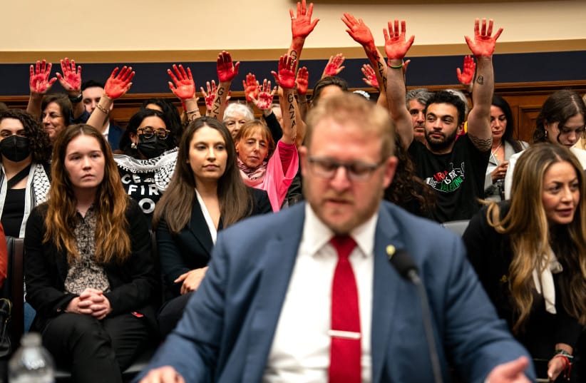 Pro-Palestinian visitors raise red-stained “bloody” hands during a House Judiciary Subcommittee on the Constitution and Limited Government hearing on antisemitism on college campuses on May 15 in Washington.
