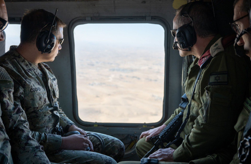 Adm. Brad Cooper, commander of the US Central Command, looks out at the view below alongside IDF Maj.-Gen. Amir Baram, director-general of the Defense Ministry in 2025.