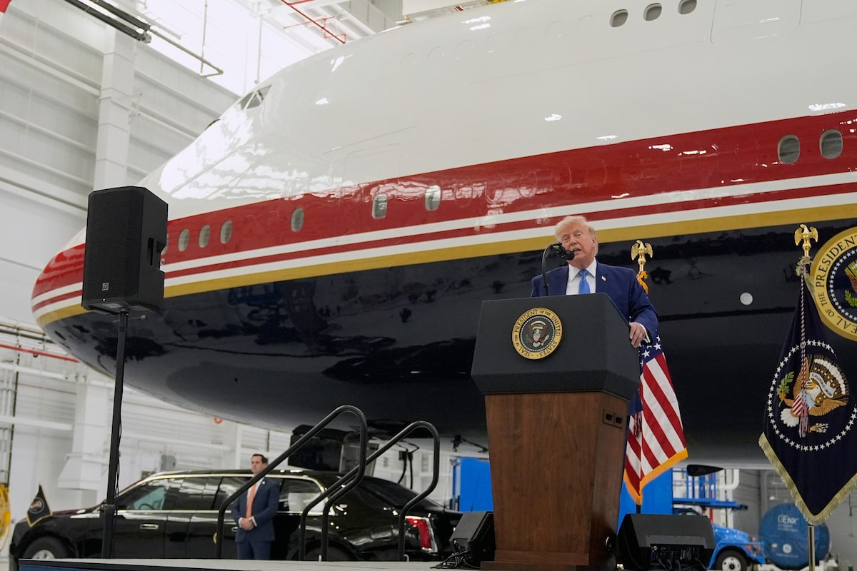 Trump unveils the new Air Force One, a converted Qatari jet with massive American flag