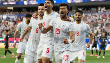 Iran opens a politically charged World Cup by playing to a 2-2 draw with New Zealand