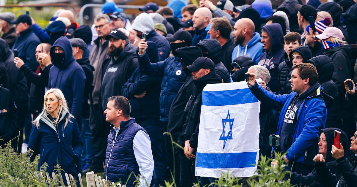 ‘Unmistakable Paisleyite DNA’ - DUP MP criticised for standing with masked men as loyalists hurl abuse at Gaza march – The Irish News