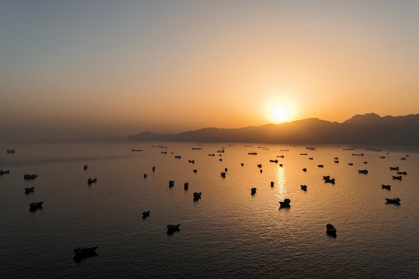 A drone view of vessles anchored in the Strait of Hormuz as seen from Musandam, Oman