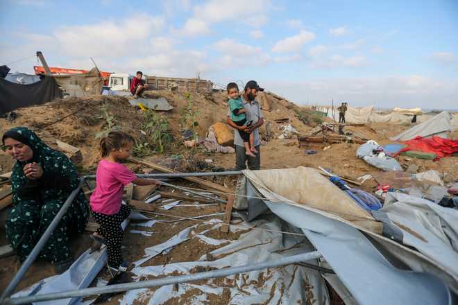 Airstrikes Hit Displacement Camp In Gaza People inspect destroyed tents at a displacement camp after alleged Israeli airstrikes hit the Sheikh Ijlin area on June 24, 2026, in Gaza City, Gaza.