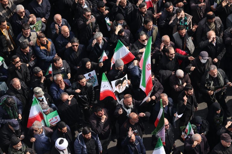 Iranians attend the funerals of Iran's Revolutionary Guards