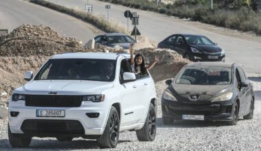 Lebanese soldiers man a checkpoint beside a Hezbollah flag at the entrance to Nabatieh on June 15, 2026, as displaced residents return to the southern city. (Mahmoud ZAYYAT / AFP)
