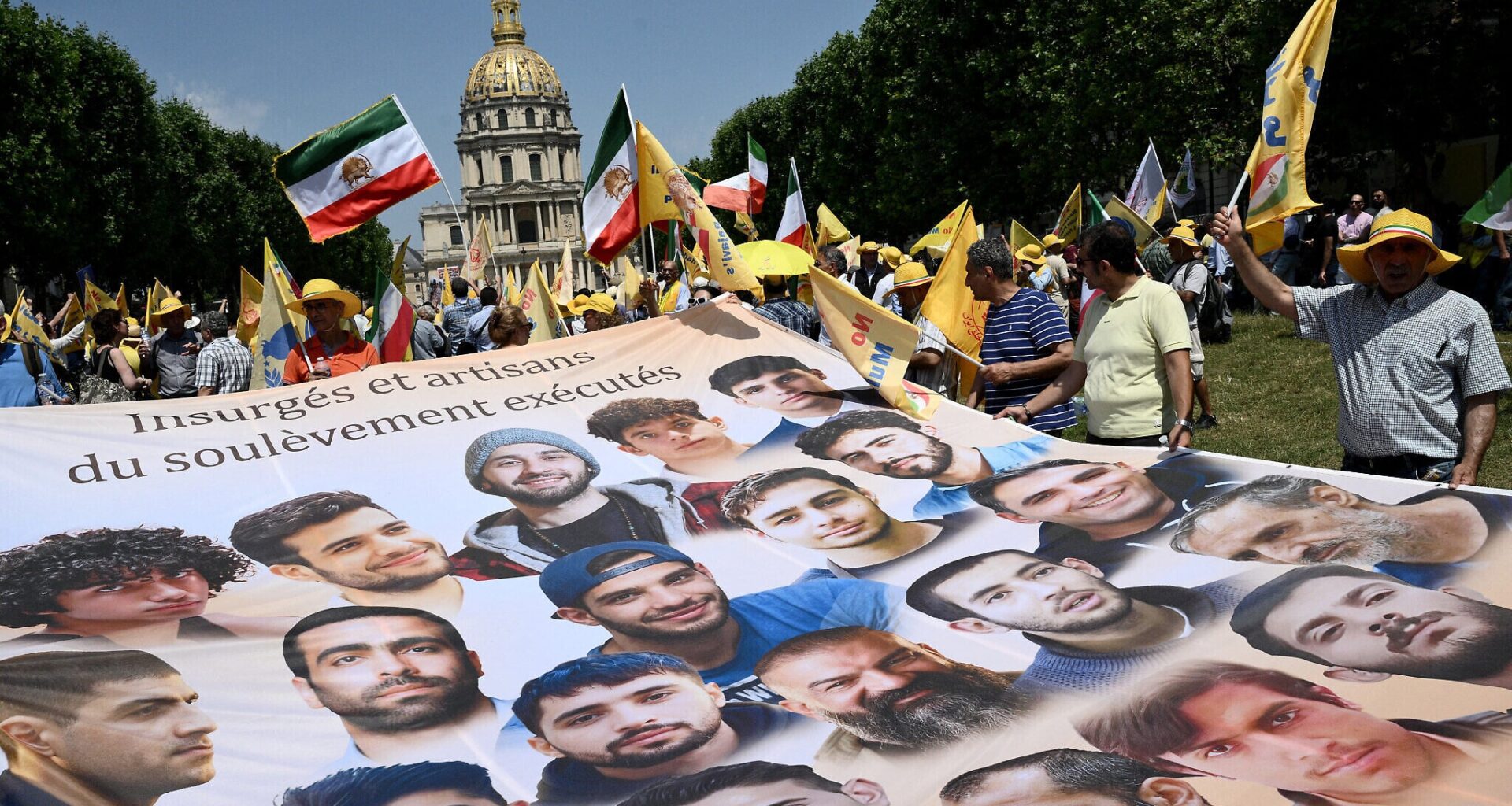 France arrests 20 after banning rally against political executions in Iran