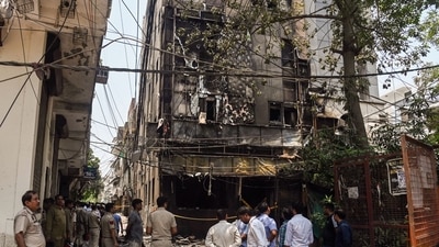 Police personnel at a site fire in a restaurant at Malviya Nagar, in New Delhi (ANI)