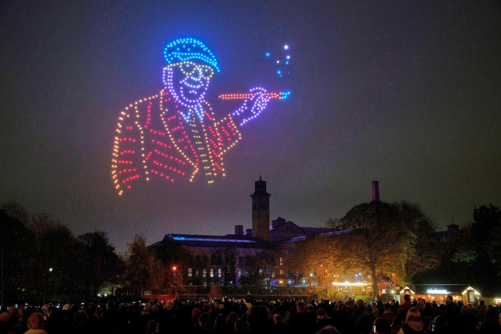 Drones display a replica of a self portrait by David Hockney from a digital selection of his iconic artworks above his hometown of Bradford, England on November 13, 2025