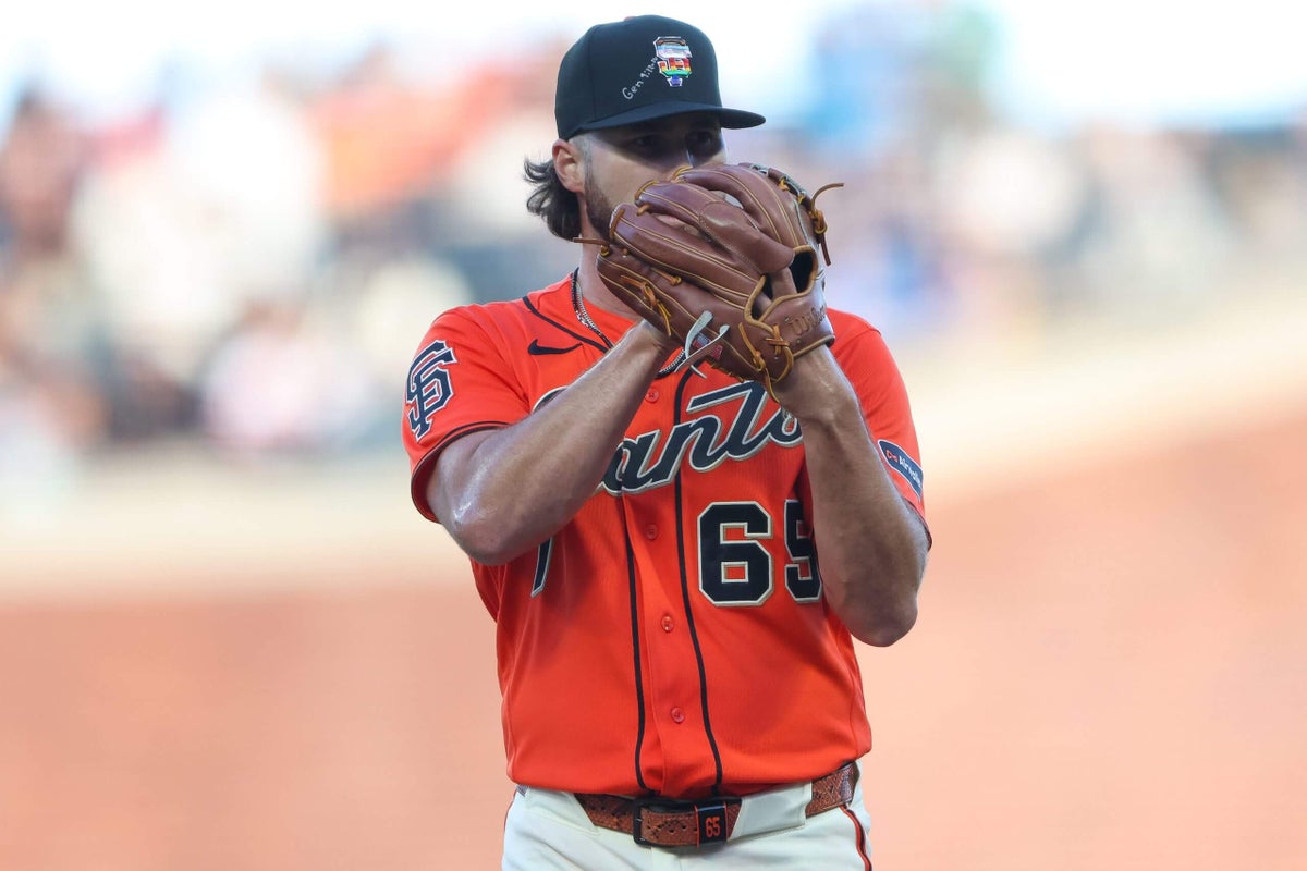 MLB issues warning to Giants pitchers who wrote Bible verses on Pride Night caps