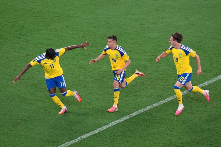 Sweden's Yasin Ayari (18) celebrates with Anthony Elanga (11) and Mattias Svanberg (19) after scoring their fifth goal during the World Cup Group F soccer match between Sweden and Tunisia in Guadalupe, near Monterrey, Mexico, Sunday, June 14, 2026. (AP Photo/Dolores Ochoa)