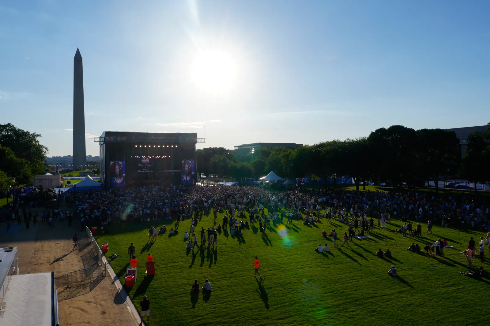 People arrive before President Donald Trump speaks at the opening of the Great American State Fair on the National Mall, Wednesday, June 24, 2026, in Washington. (AP Photo/Jen Golbeck)