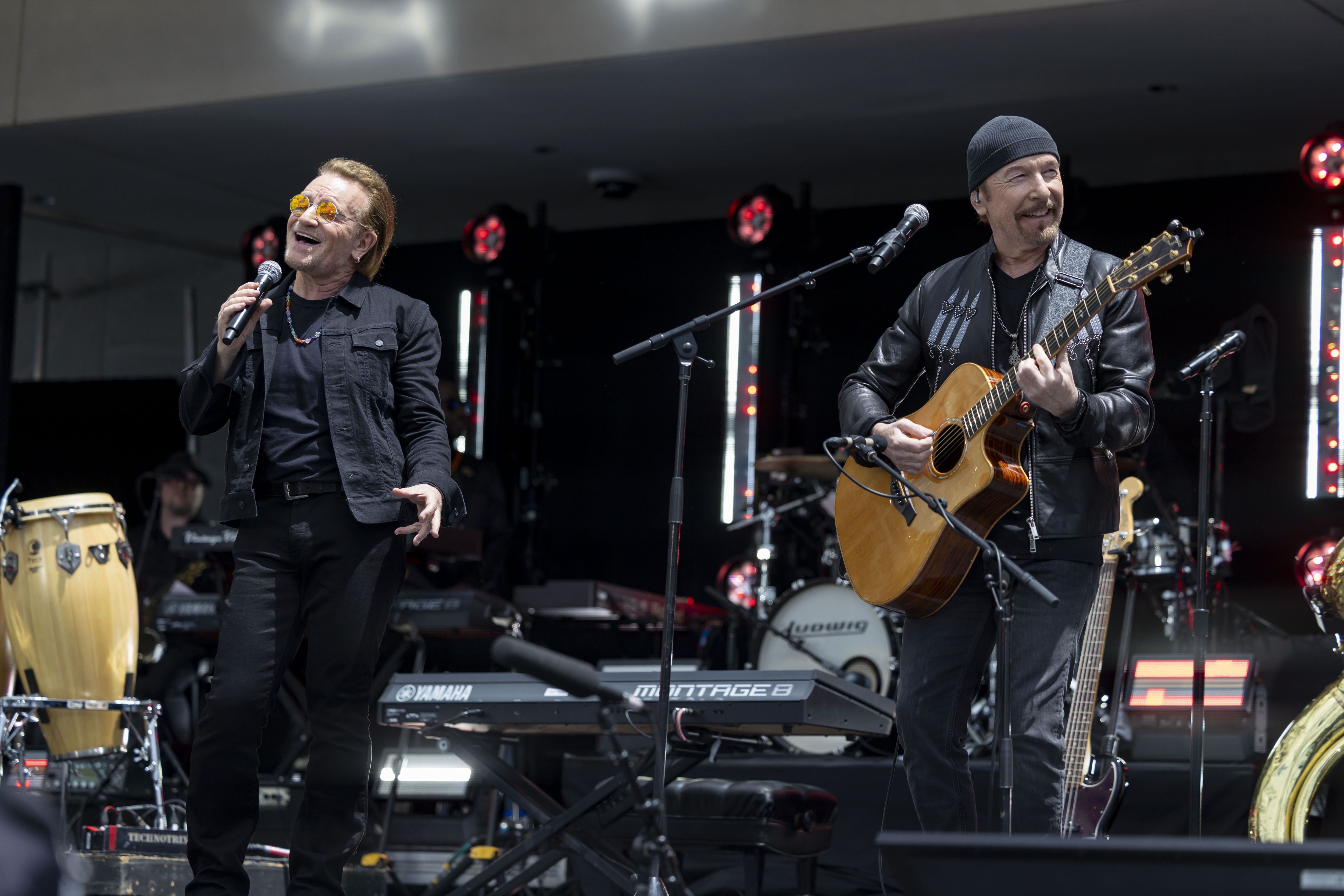 Bono and The Edge perform during the opening of the...