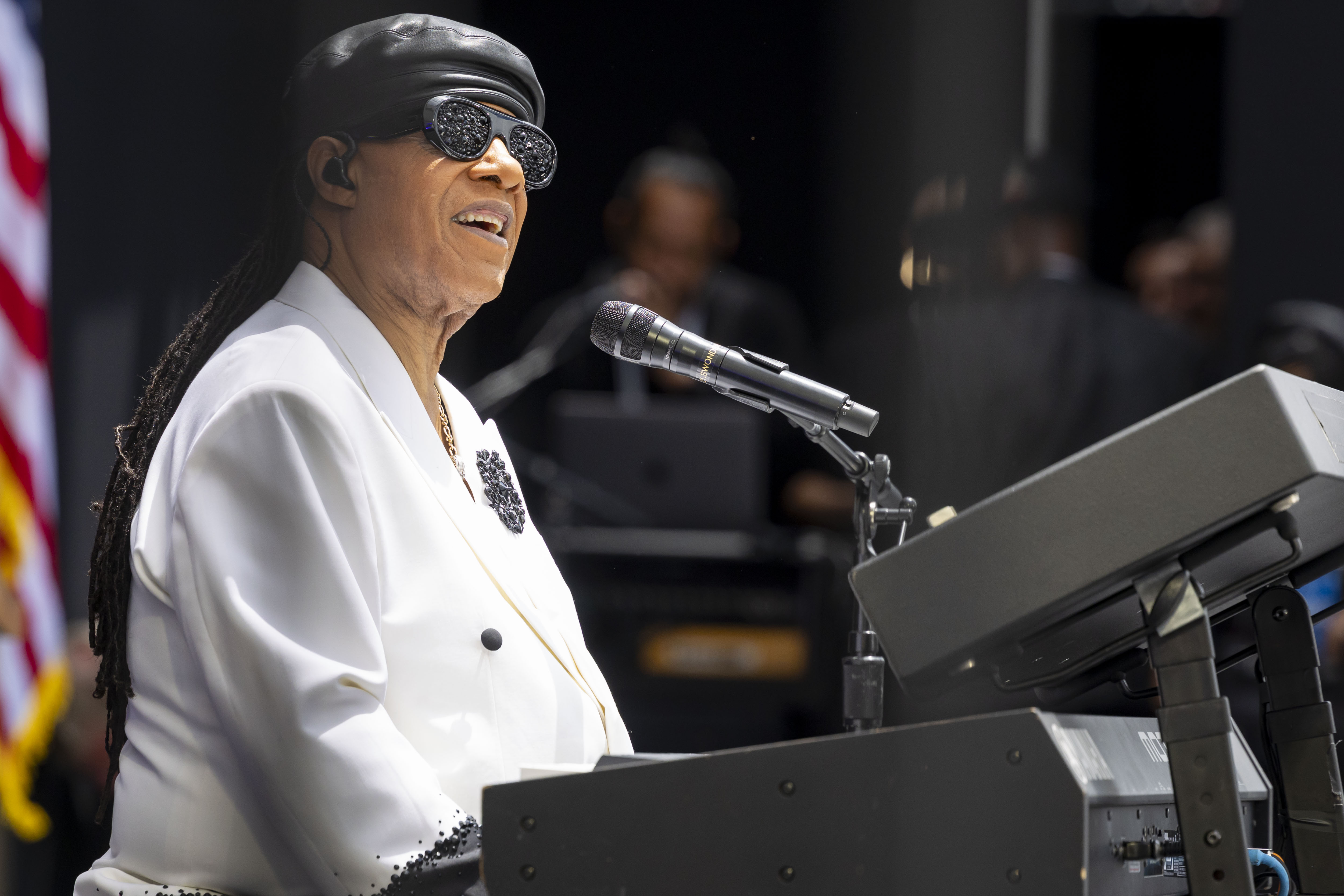 Stevie Wonder performs during the opening of the Obama Presidential...