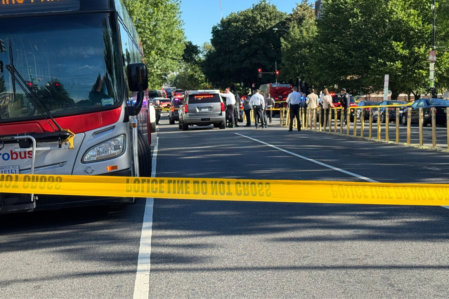 metrobus, police cars, crime tape