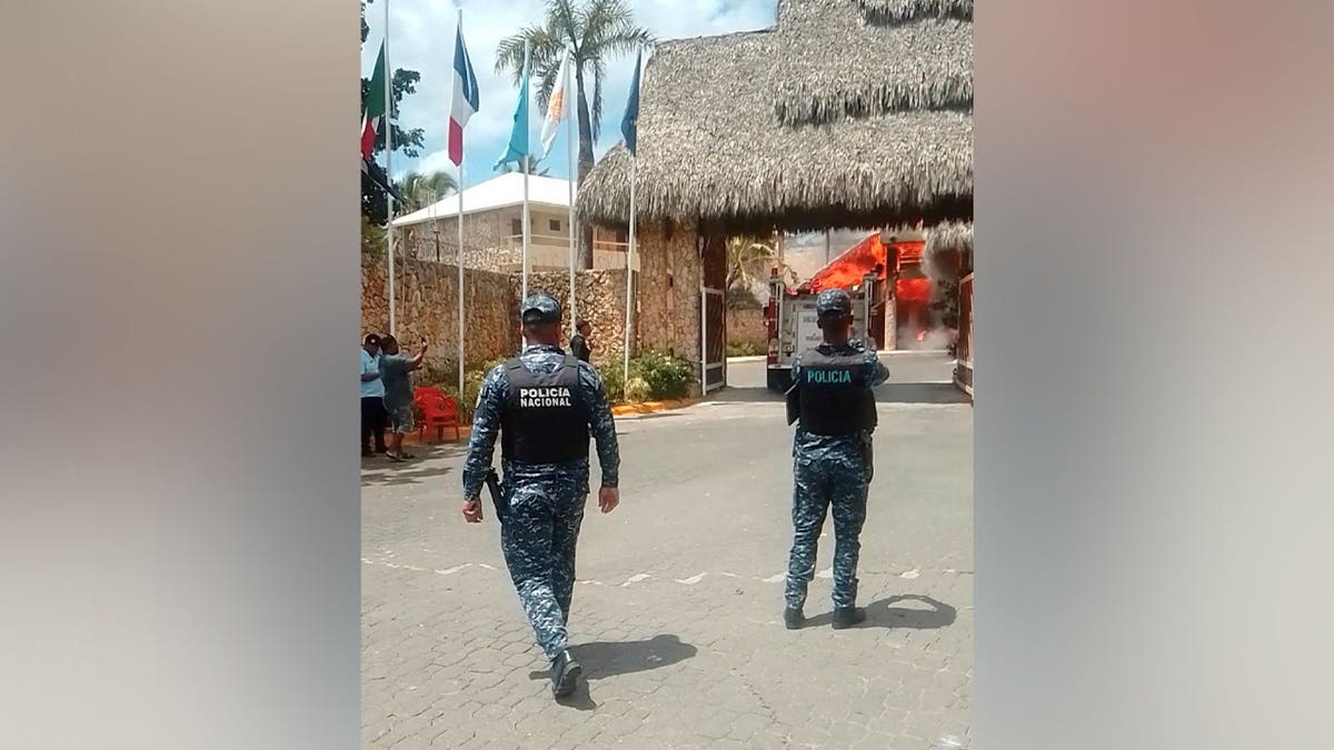 Police officers operate following a fire at a Viva Dominicus resort in Bayahibe, La Altagracia, Dominican Republic, June 19, 2026.