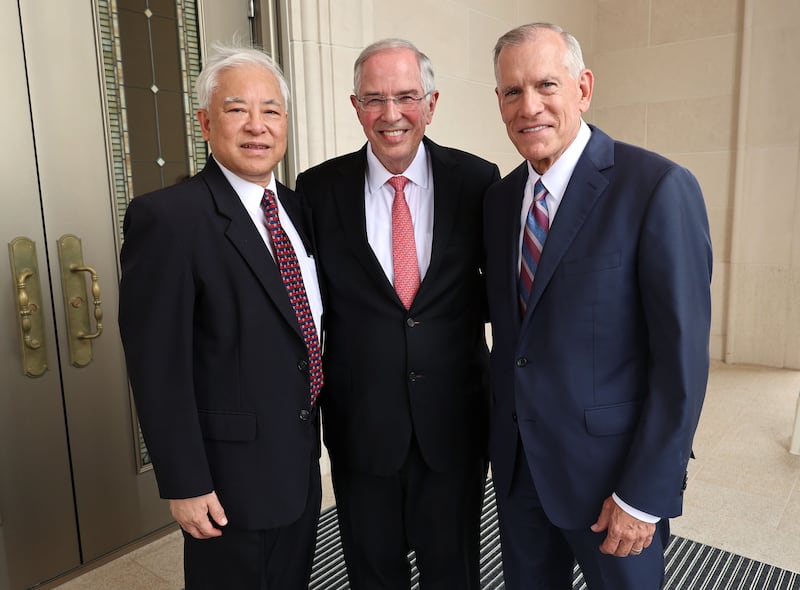 Elder Neil L. Andersen of the Quorum of the Twelve Apostles, center, Elder Steven R. Bangerter, General Authority Seventy and executive director of the Temple Department, right, and Elder Chi Hong (Sam) Wong, General Authority Seventy and first counselor in the Philippines Area presidency, pause for the photo outside the Bacolod Philippines Temple in Bacolod City, Philippines, on Saturday, May 30, 2026.