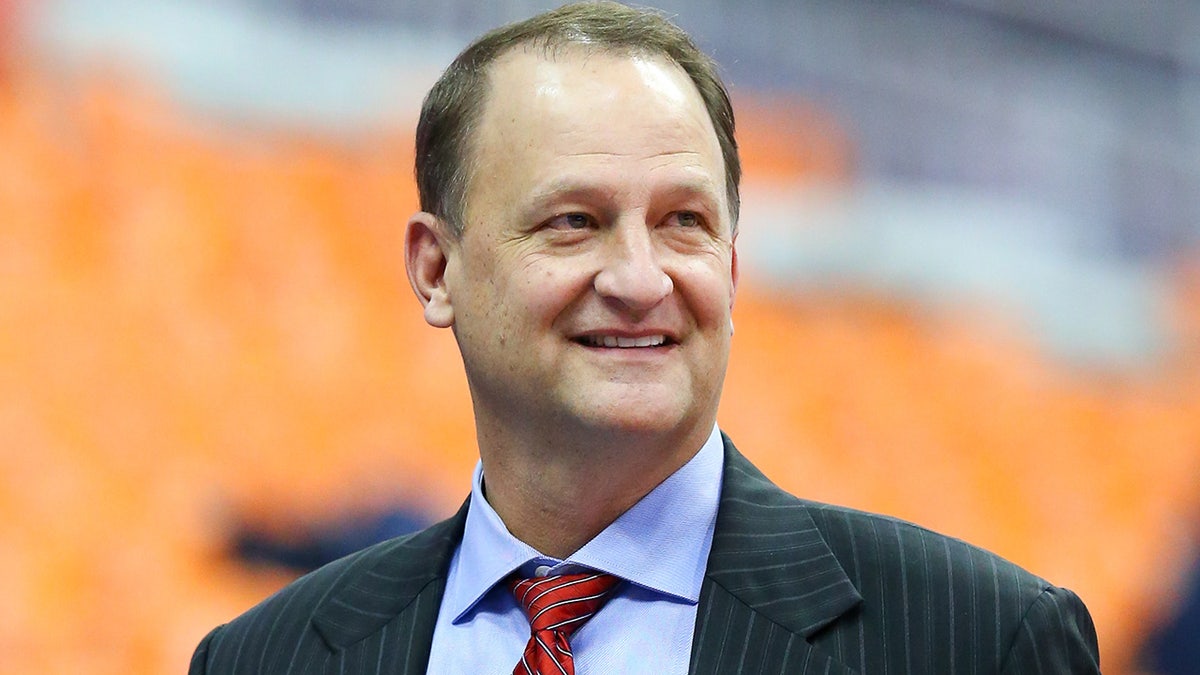 Dan Dakich speaking while Jon Wertheim listens during an interview.