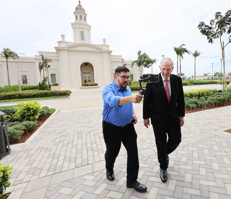 Elder Neil L. Andersen of the Quorum of the Twelve Apostles is interviewed by a journalist on the Bacolod Philippines Temple grounds in Bacolod City, Philippines, on Saturday, May 30, 2026.