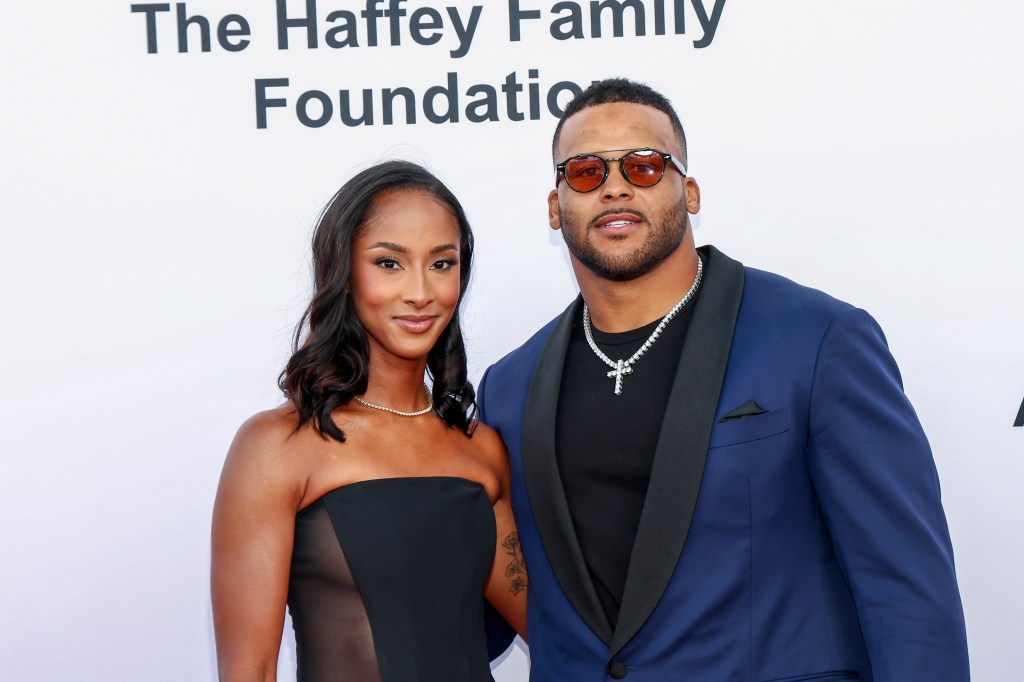 Erica Donald and Aaron Donald posing together at the Harold and Carole Pump Foundation 25th Anniversary Celebrity Dinner.