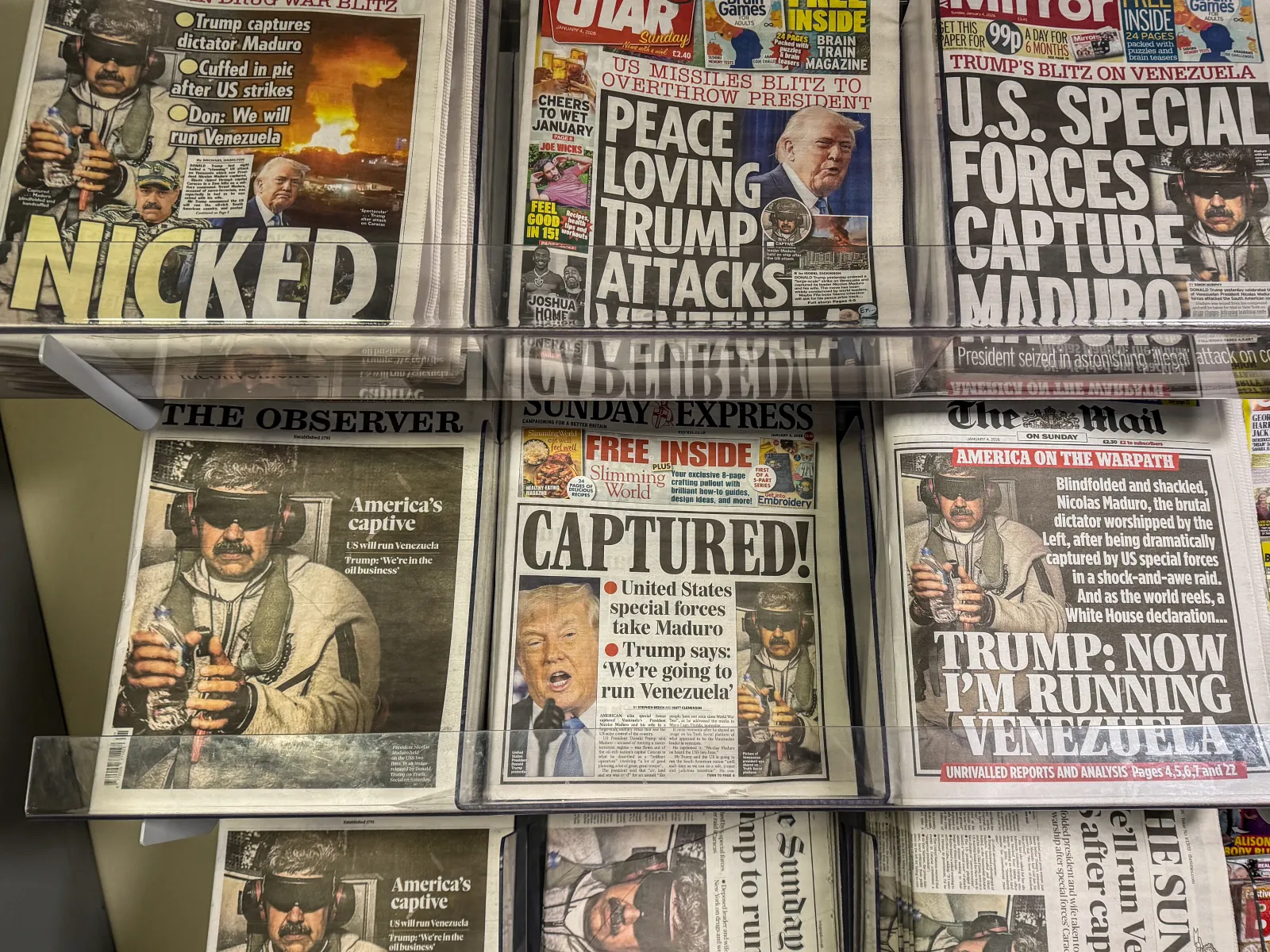 At a newsstand in Somerset, England, on January 4, papers' front pages display stories on the U.S. capture and arrest of then-Venezuelan President Nicolas Maduro. (Photo by Matt Cardy/Getty Images)