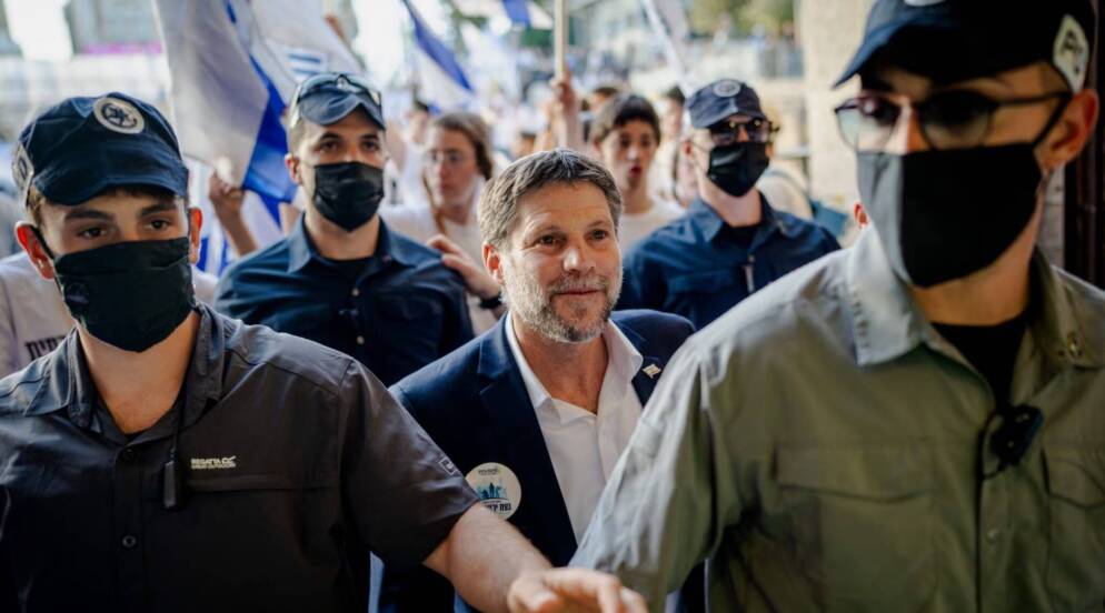 Israel's Finance Minister Bezalel Smotrich takes part in the Jerusalem Day parade at the Damascus Gate in the old city of Jerusalem, May 14, 2026. The controversial annual march sees thousands of nationalist Israelis celebrate the capture of the formerly Jordanian-held east of the city during the Six-Day War in 1967.