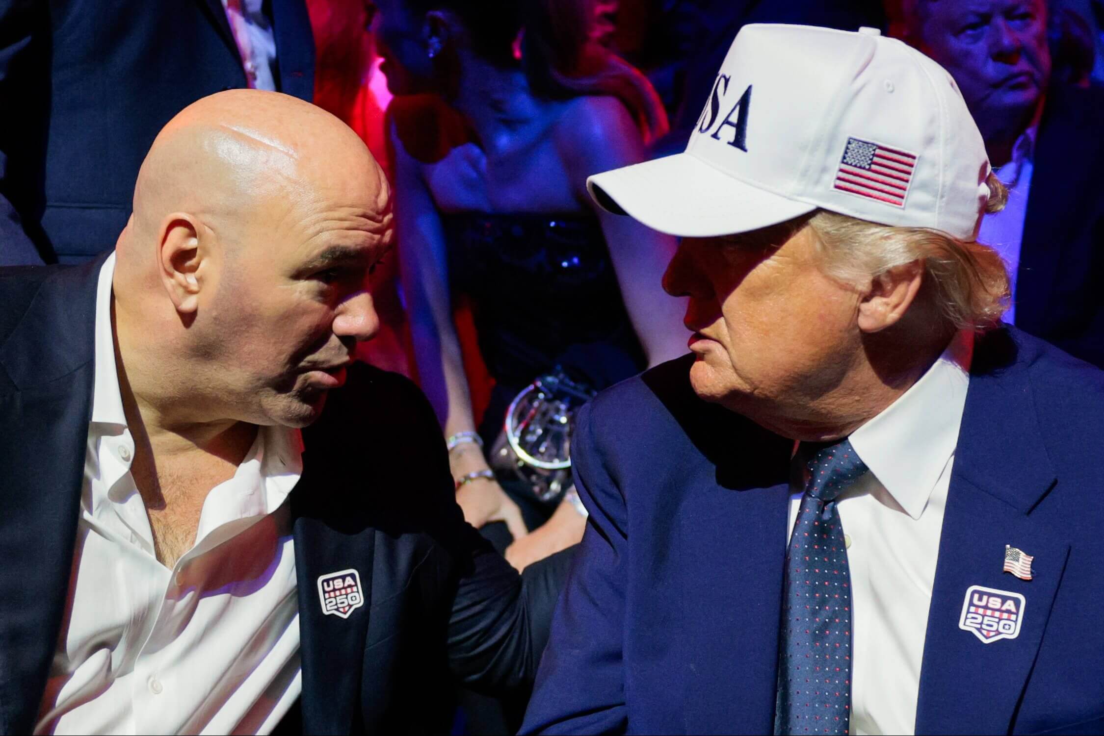 UFC CEO Dana White talks with U.S. President Donald Trump.