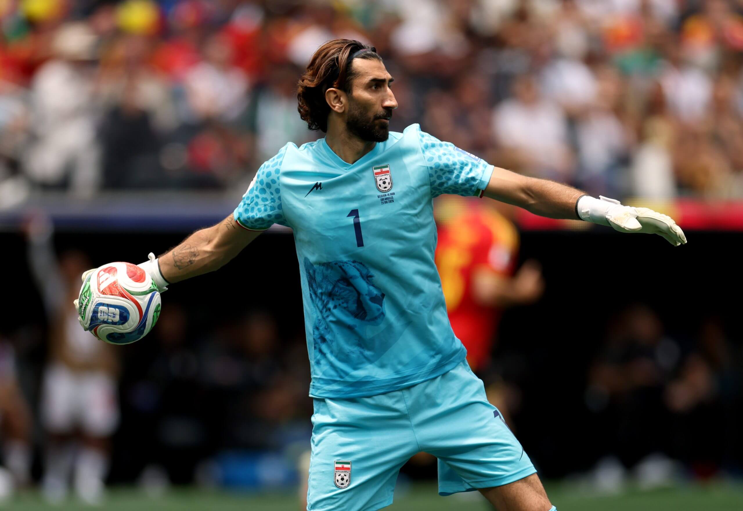 Alireza Beiranvand throws the ball out against Belgium